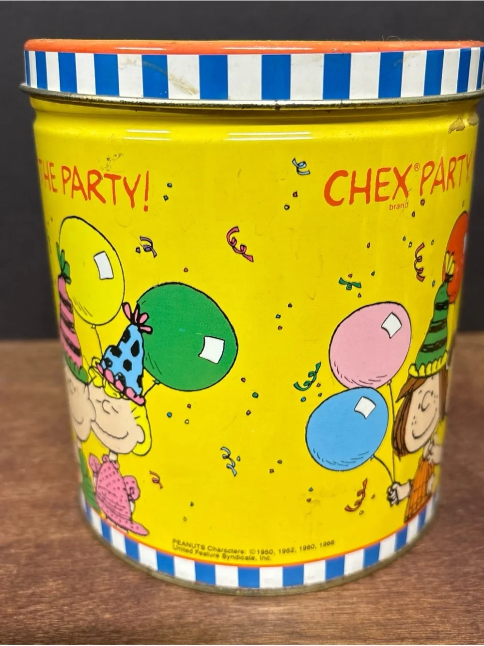 Peanuts Yellow Party Mix Tin with Multicolor Cartoon Characters